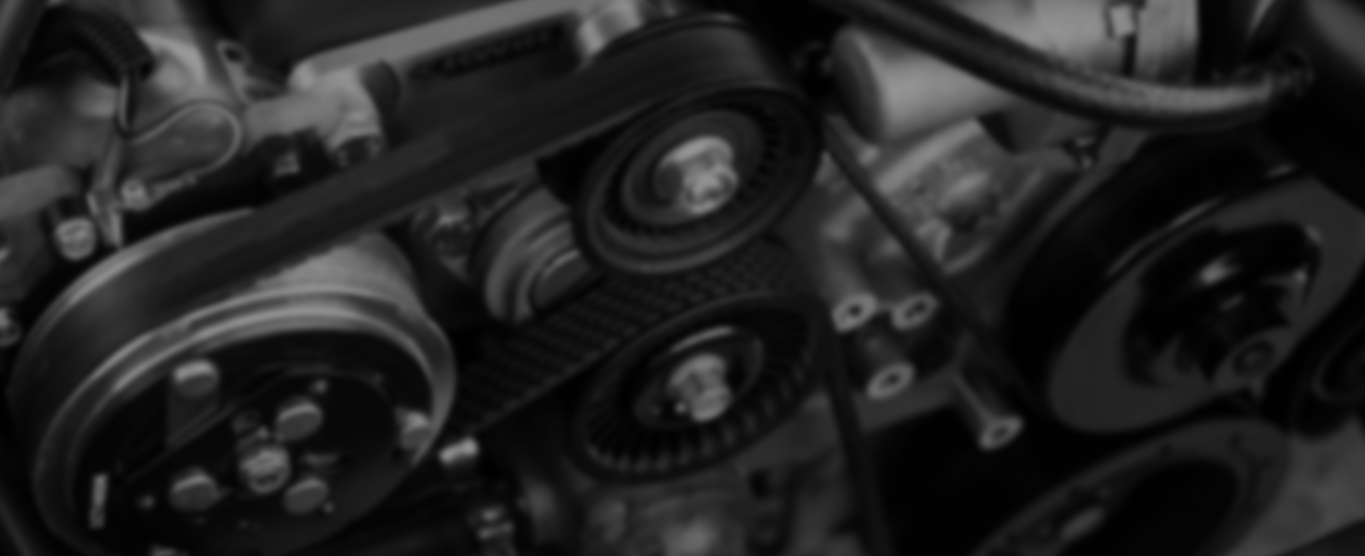 open top engine showing belt and pulleys